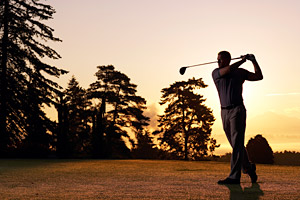 Man golfing - Copyright – Stock Photo / Register Mark