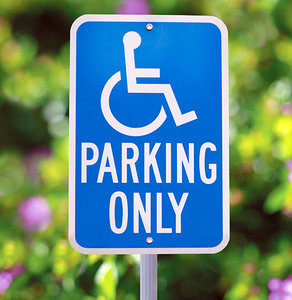 handicap parking sign - Copyright – Stock Photo / Register Mark