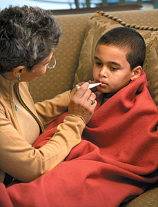 kid with fever - Copyright – Stock Photo / Register Mark