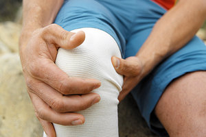 knee pain - Copyright – Stock Photo / Register Mark