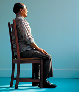 man sitting with good posture - Copyright – Stock Photo / Register Mark