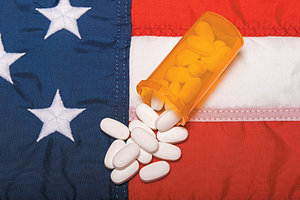 US flag and pills - Copyright – Stock Photo / Register Mark